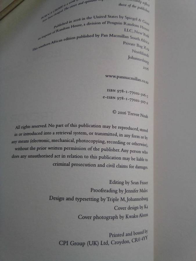 "Born a Crime`  Trevor Noah.  Soft cover.