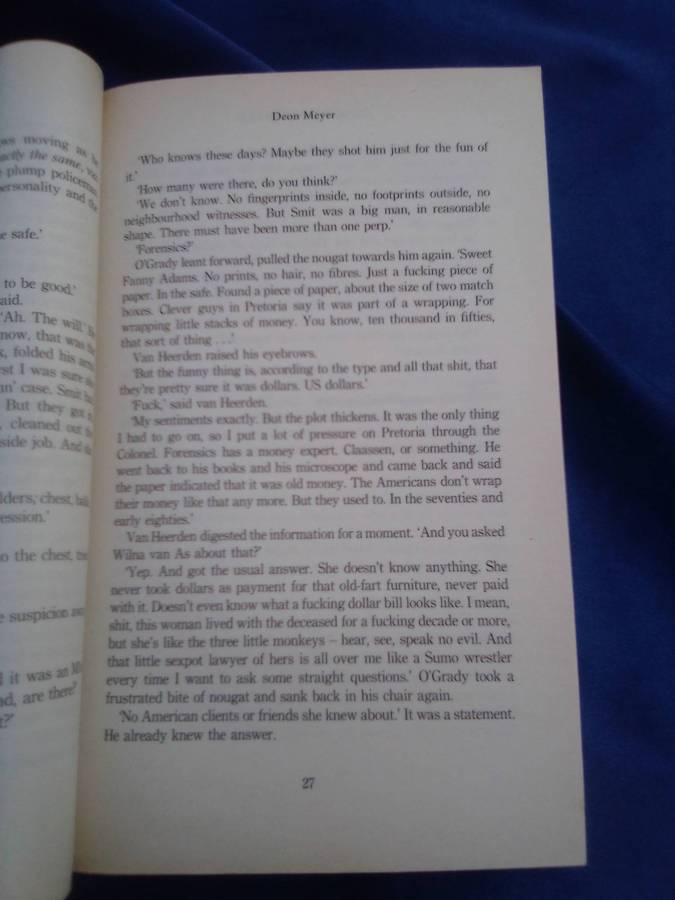 "Dead at Daybreak"  Deon Meyer.  Soft cover.