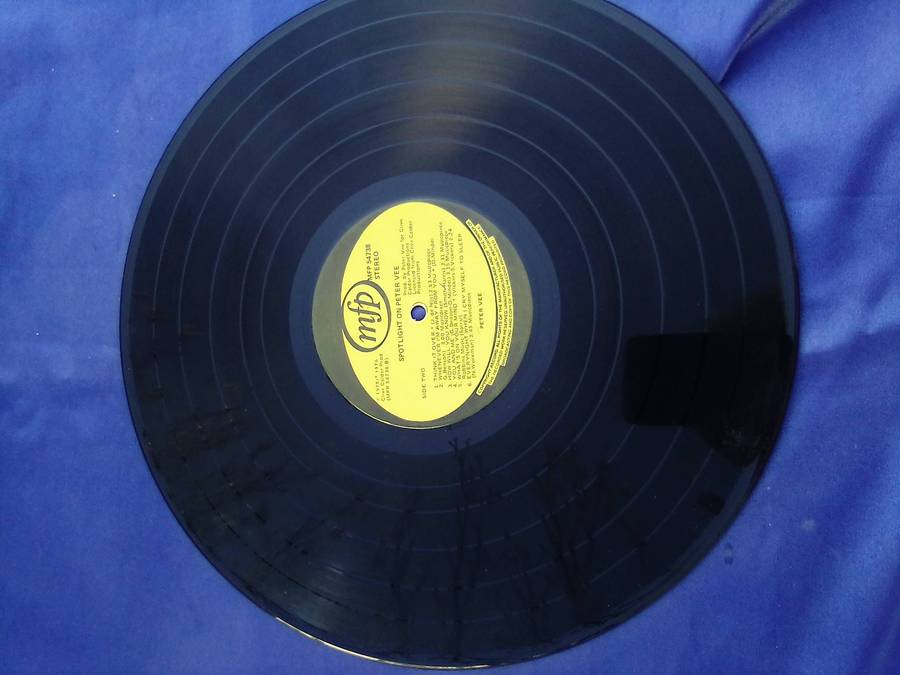 L.P. Peter Vee.   Cover: Good. L.P.:Very good.