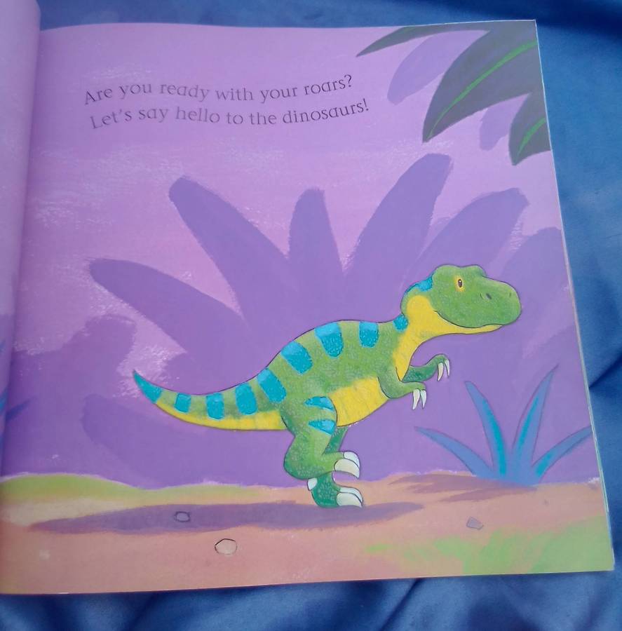 "Say Hello to the Dinosaurs"  Soft cover.