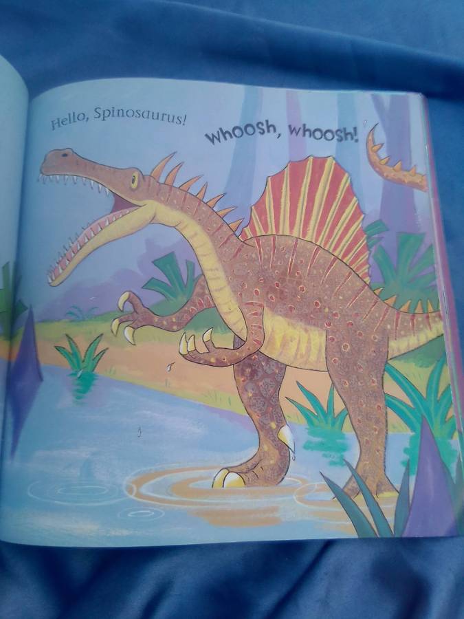 "Say Hello to the Dinosaurs"  Soft cover.
