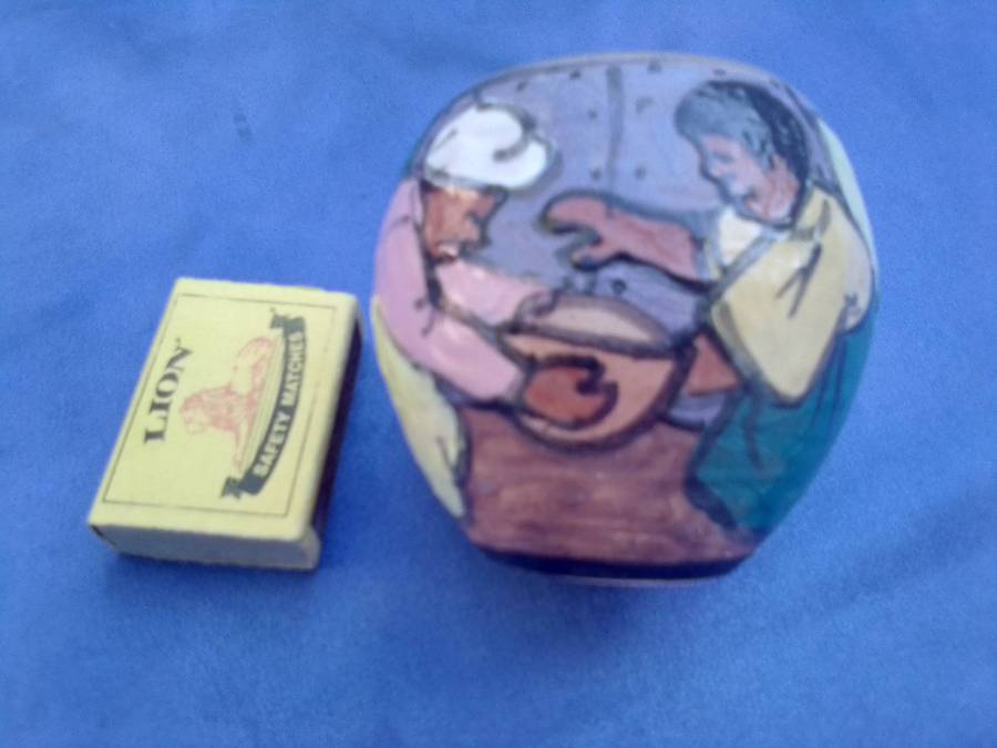 Small, painted and signed pot.