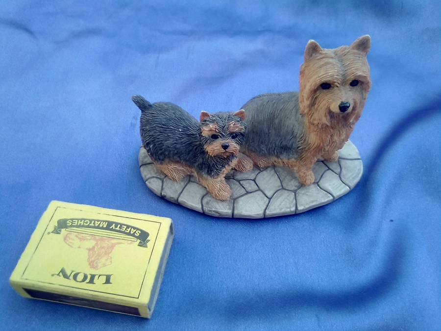 Yorkshire Terrier with puppy. Small  dogs figurine.
