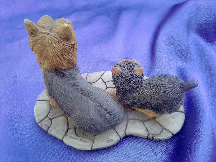Yorkshire Terrier with puppy. Small  dogs figurine.