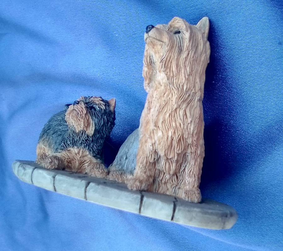 Yorkshire Terrier with puppy. Small  dogs figurine.