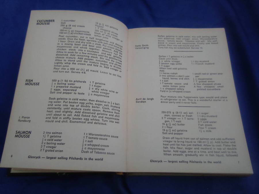 `"Die Huisvroue Liga / The Housewives League Cookery Book" Hard cover.