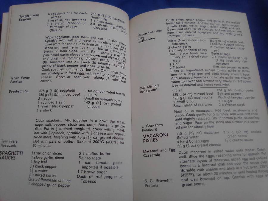 `"Die Huisvroue Liga / The Housewives League Cookery Book" Hard cover.