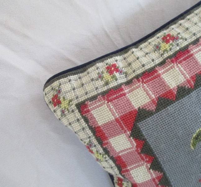 A cute Rug Barn "Needlepoint by hand" tapestry cushion