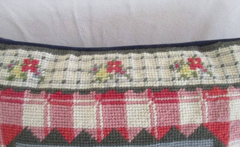 A cute Rug Barn "Needlepoint by hand" tapestry cushion