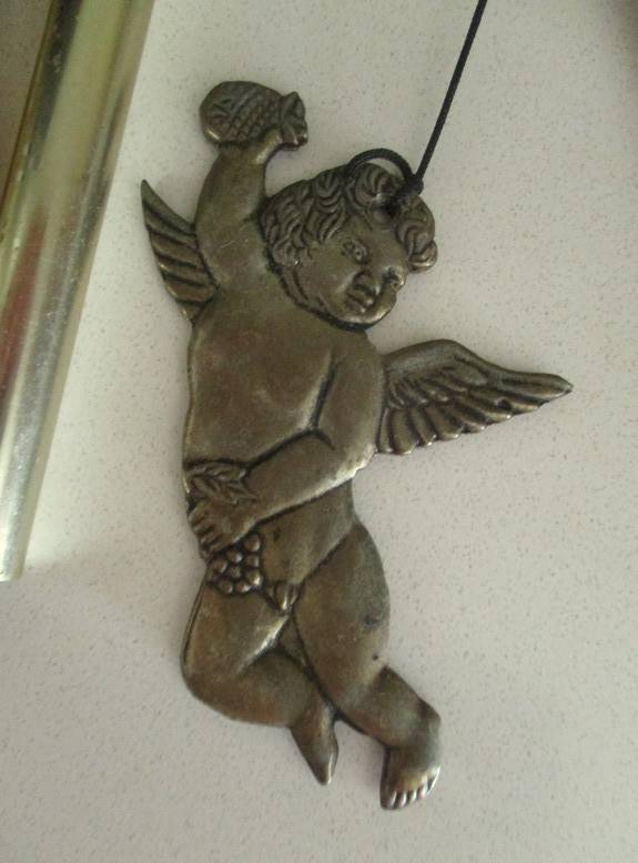 Brass cherub wind chimes with lovely tinkling sound
