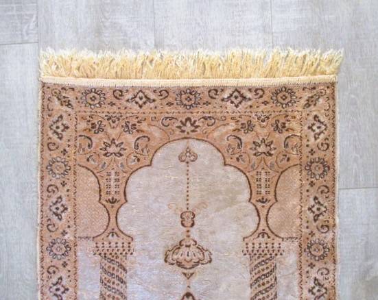 A light weight, machine made  Turkish prayer mat depicting Mosque interior - silk?