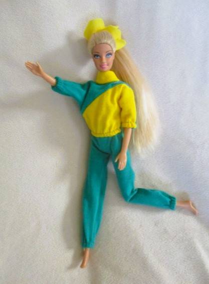 Relisted - An articulated Mattel Barbie doll with very long hair in cute Barbie? tracksuit