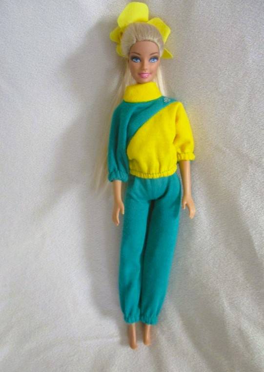 Relisted - An articulated Mattel Barbie doll with very long hair in cute Barbie? tracksuit