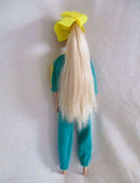 Relisted - An articulated Mattel Barbie doll with very long hair in cute Barbie? tracksuit