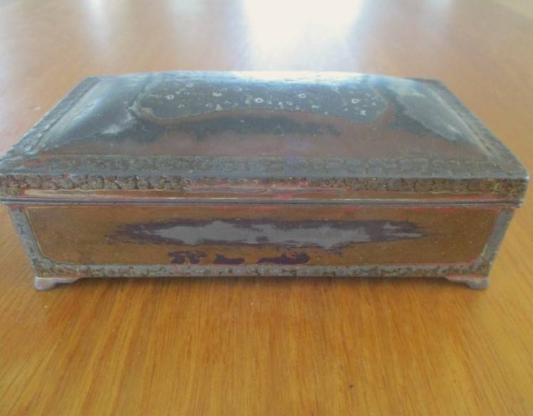 A very old metal oriental? cigar/ cigarette box with wooden interior - loads of character - signed