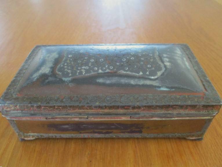 A very old metal oriental? cigar/ cigarette box with wooden interior - loads of character - signed