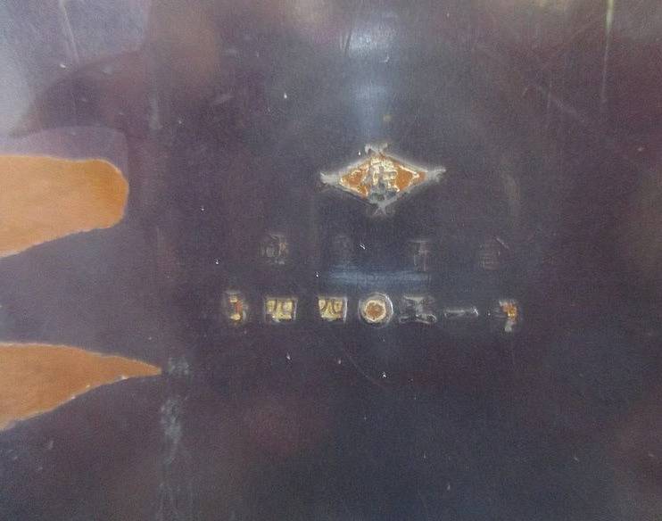 A very old metal oriental? cigar/ cigarette box with wooden interior - loads of character - signed