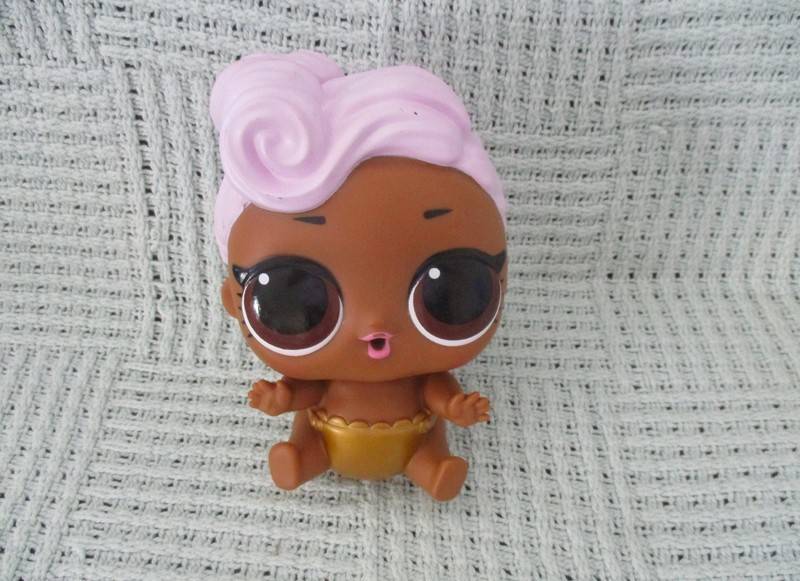 An adorable larger size LOL Surprise doll