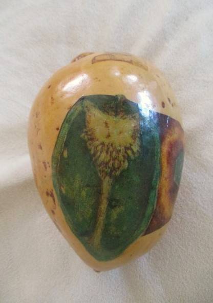 Four real hand painted and very decorative Calabashes