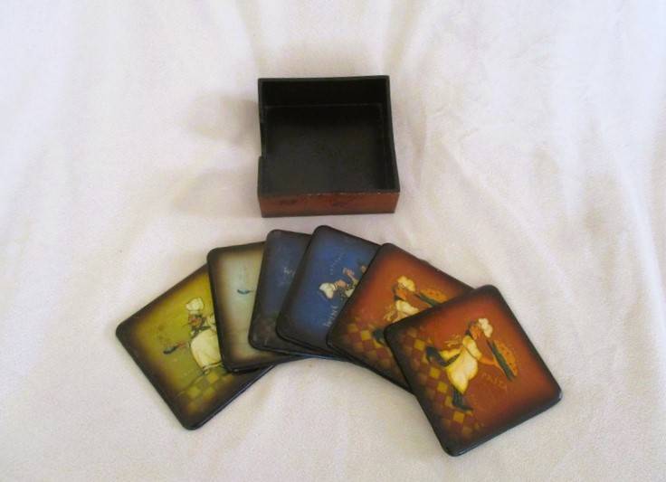 A set of six charming Chef coasters in holder