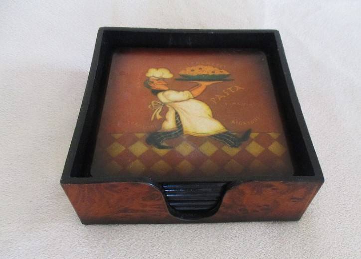 A set of six charming Chef coasters in holder