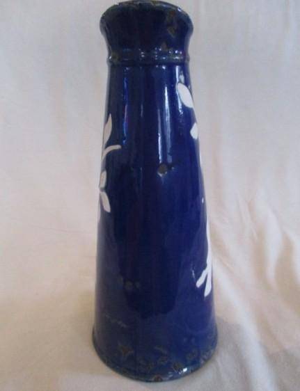 Large, unique purposefully antique-looking ceramic jug vase made to resemble aged enamel