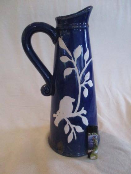 Large, unique purposefully antique-looking ceramic jug vase made to resemble aged enamel