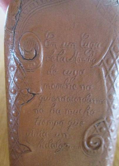 Two beautifully decorative Spanish hand made leather embossed decanters