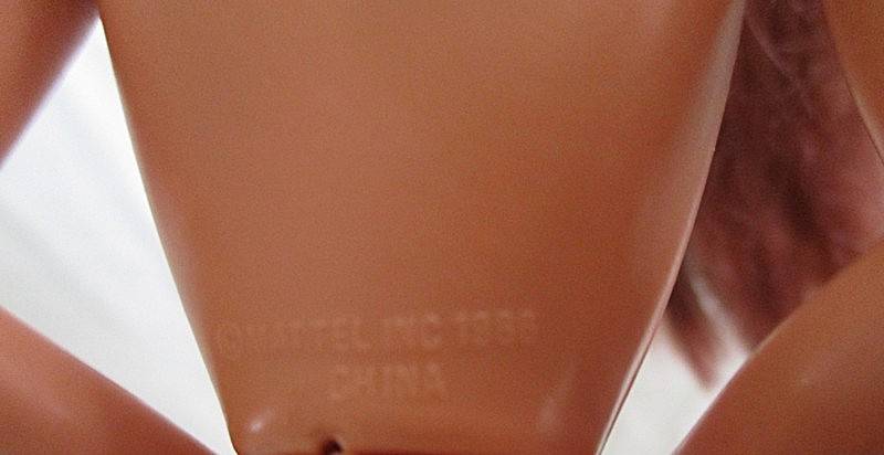 A Mattel Barbie with gorgeous EXTRA long red hair in colourful gypsy outfit with boots - knees bend