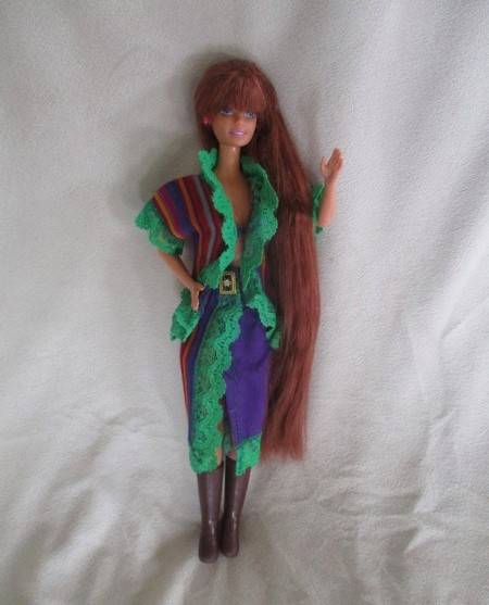 A Mattel Barbie with gorgeous EXTRA long red hair in colourful gypsy outfit with boots - knees bend