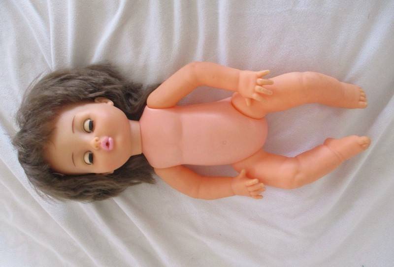 Vintage 40cm First Love brunette doll in original dress