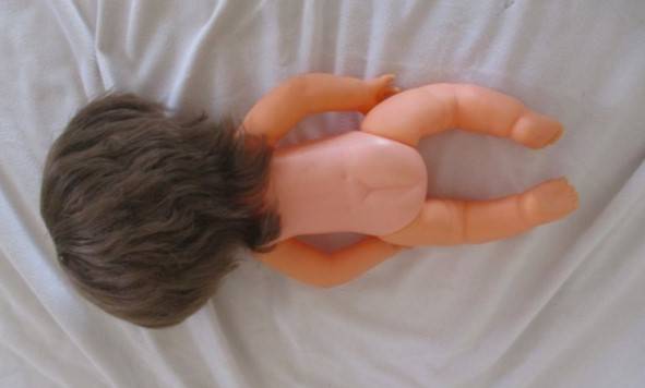 Vintage 40cm First Love brunette doll in original dress