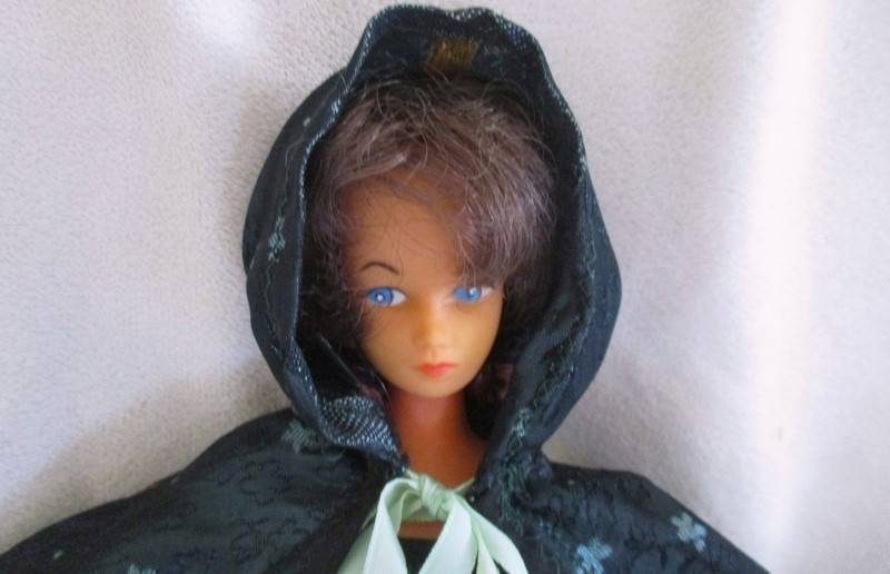 Collectable vintage 1960's Barbie clone doll made in Hong Kong in gorgeous dress and cape