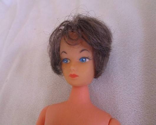 Collectable vintage 1960's Barbie clone doll made in Hong Kong in gorgeous dress and cape