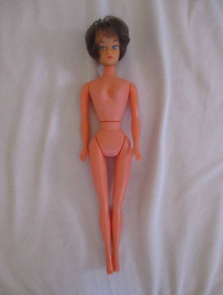 Collectable vintage 1960's Barbie clone doll made in Hong Kong in gorgeous dress and cape