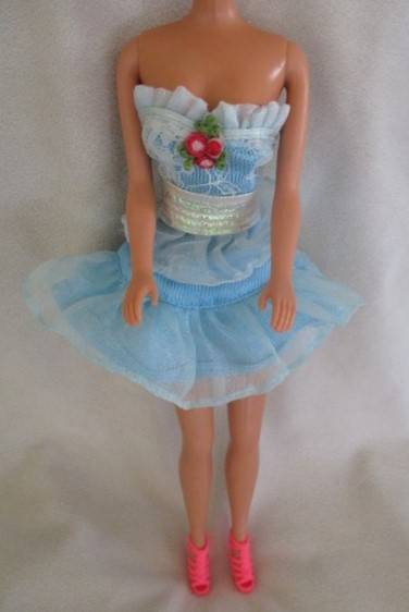 Vintage 1980's/90's Mattel Barbie doll with tight blonde curls - knees that bend