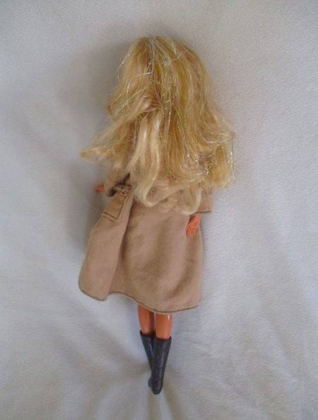 A Mattel Barbie doll with tinsel in her hair - 1991 Sun Sensation Barbie? -  Knees bend