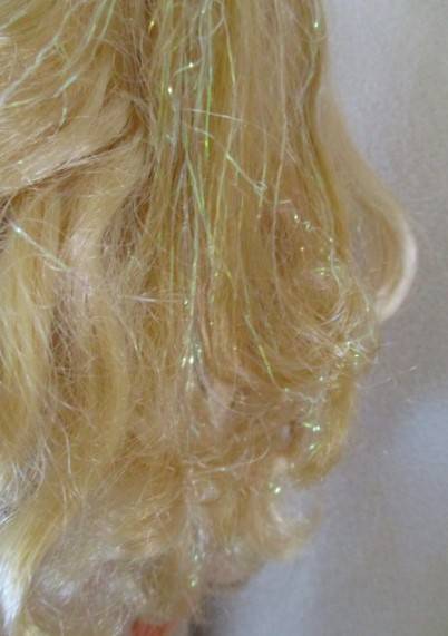 A Mattel Barbie doll with tinsel in her hair - 1991 Sun Sensation Barbie? -  Knees bend