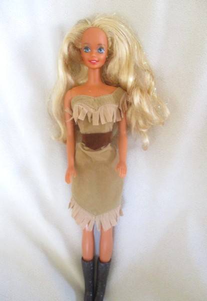 A Mattel Barbie doll with tinsel in her hair - 1991 Sun Sensation Barbie? -  Knees bend