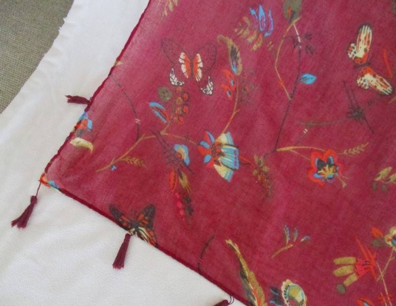 A delicate cloth with pretty butterfly and flowers design