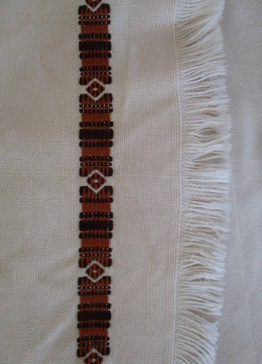 A large, quality throw with embroidered geometric design - in great condition
