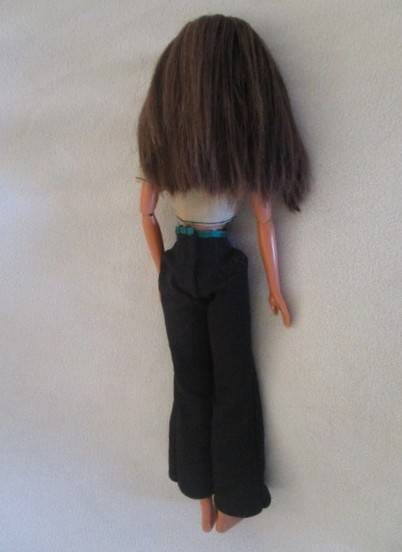 Pretty articulated Mattel Barbie with original top and earrings - Operations Safari Barbie?