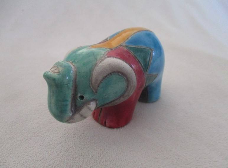 A small Raku elephant -signed by artist - great condition