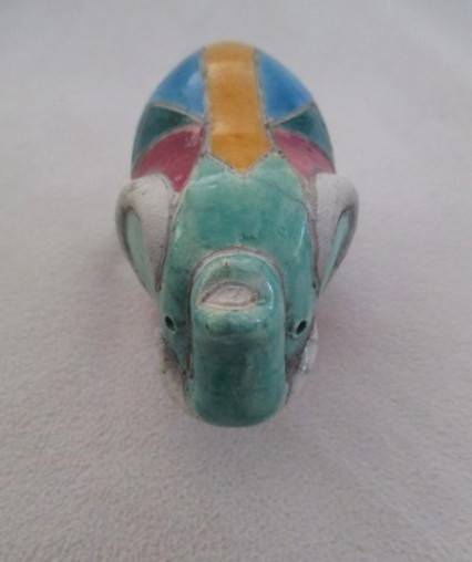 A small Raku elephant -signed by artist - great condition