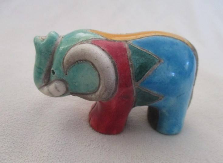 A small Raku elephant -signed by artist - great condition