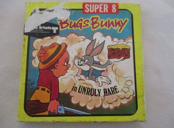Two vintage Cartoon 8mm film reels in original boxes - Bugs Bunny and Woody Woodpecker