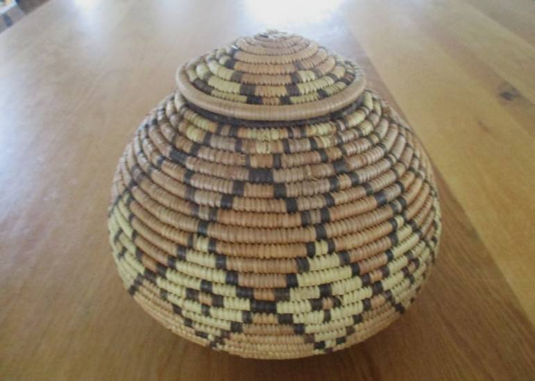 Two vintage, expertly woven lidded snake charmer's baskets in great condition