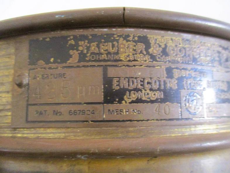 A very old antique gold panning sieve made in England