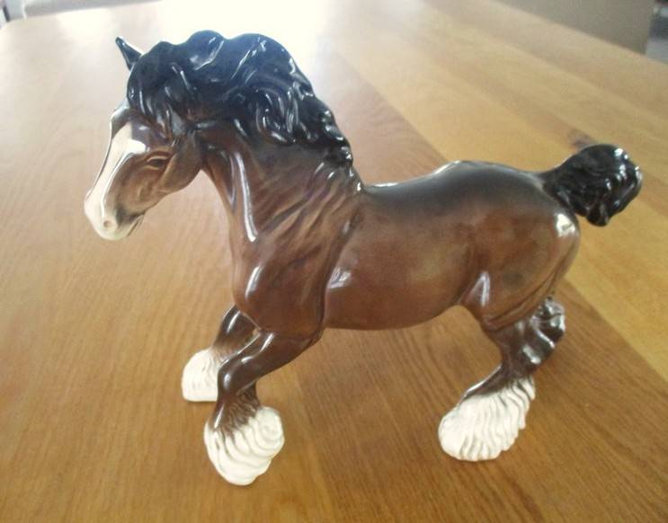 A large vintage porcelain cart horse