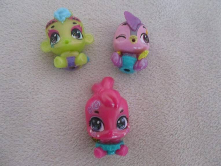 A plastic egg carton containing twelve Hatchimals CollEGGtibles